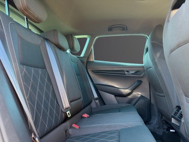 Skoda karoq 1.5 tsi 150 ch act dsg7 sportline carplay suivi skoda garantie 12 mois occasion simplicicar rennes simplicicar...