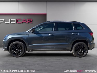 Skoda karoq 1.5 tsi 150 ch act dsg7 sportline carplay suivi skoda garantie 12 mois occasion simplicicar rennes simplicicar...