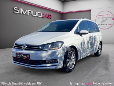 Volkswagen touran 110ch carat dsg7 hayon electrique premiere main suivi volkswagen garantie 12 mois occasion montpellier (34)...