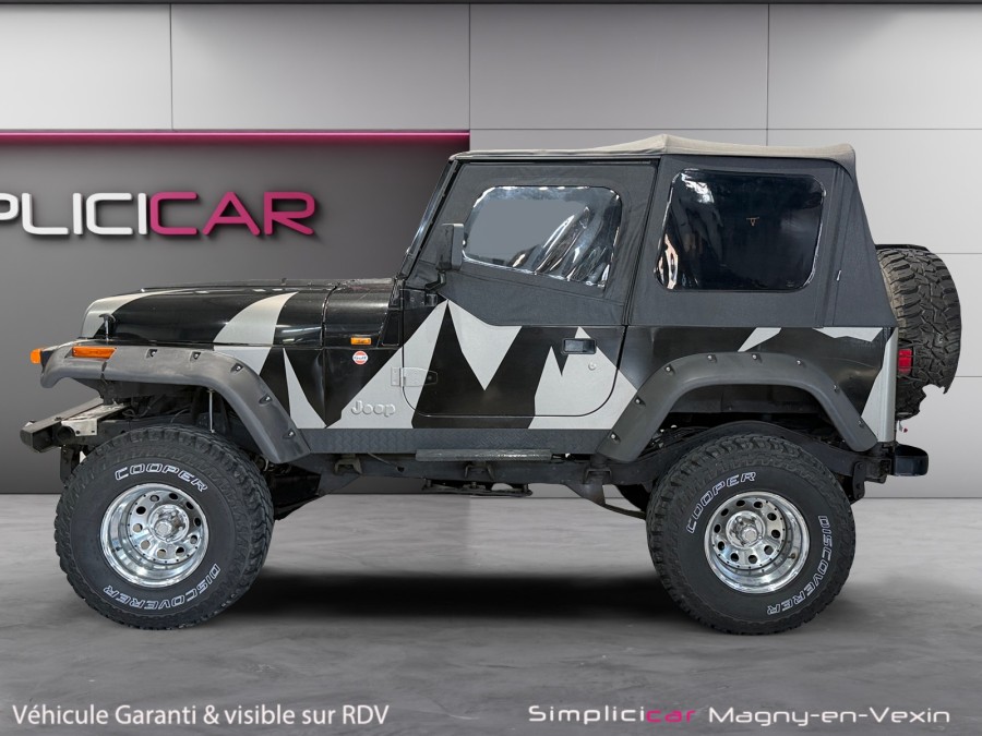 JEEP d'occasion WRANGLER 2.5 TEXAN BACHE de 1992 Magny-en-Vexin (95)﻿