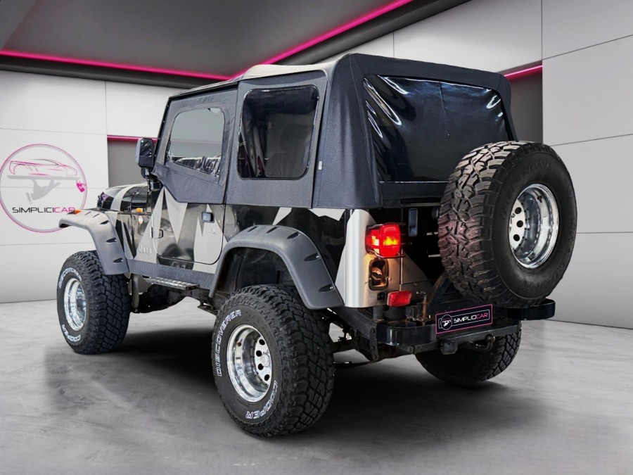 JEEP d'occasion WRANGLER 2.5 TEXAN BACHE de 1992 Magny-en-Vexin (95)﻿