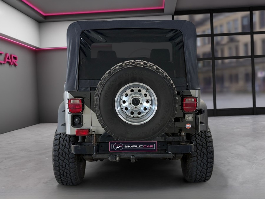 JEEP d'occasion WRANGLER 2.5 TEXAN BACHE de 1992 Magny-en-Vexin (95)﻿