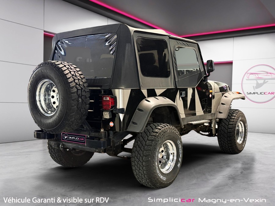 JEEP d'occasion WRANGLER 2.5 TEXAN BACHE de 1992 Magny-en-Vexin (95)﻿