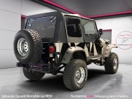 JEEP d'occasion WRANGLER 2.5 TEXAN BACHE de 1992 Magny-en-Vexin (95)﻿