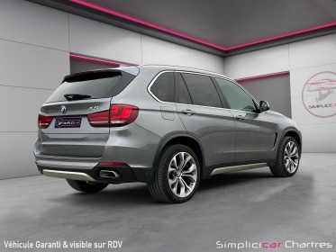 Bmw x5 f15 xdrive40d 313 ch exclusive a garantie 12 mois occasion simplicicar chartres  simplicicar simplicibike france