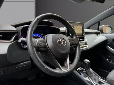Toyota corolla hybride 122h collection toit ouvrant/ camera de recul / garantie 12 mois occasion paris 17ème (75)(porte...