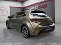 Toyota corolla hybride 122h collection toit ouvrant/ camera de recul / garantie 12 mois occasion paris 17ème (75)(porte...