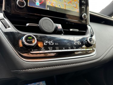 Toyota corolla hybride 122h collection toit ouvrant/ camera de recul / garantie 12 mois occasion paris 17ème (75)(porte...