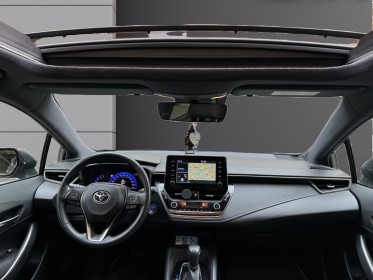 Toyota corolla hybride 122h collection toit ouvrant/ camera de recul / garantie 12 mois occasion paris 17ème (75)(porte...