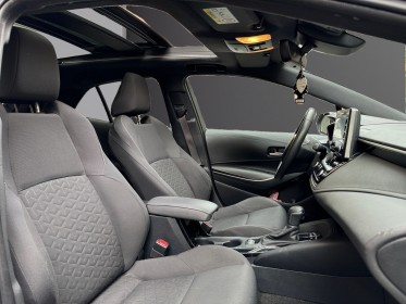 Toyota corolla hybride 122h collection toit ouvrant/ camera de recul / garantie 12 mois occasion paris 17ème (75)(porte...