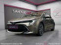 Toyota corolla hybride 122h collection toit ouvrant/ camera de recul / garantie 12 mois occasion paris 17ème (75)(porte...