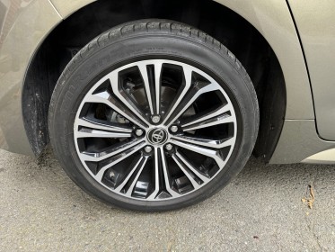 Toyota corolla hybride 122h collection toit ouvrant/ camera de recul / garantie 12 mois occasion paris 17ème (75)(porte...