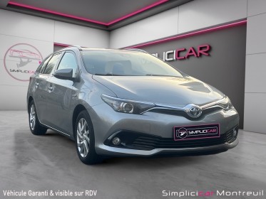 Toyota auris touring sports my17 hybride 136h design garantie 12 mois sort de révision occasion montreuil (porte de...