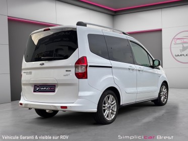 Ford tourneo courier 1.0 e 100 bv6 ss titanium // garantie 12 mois-bien entretenue occasion simplicicar brest simplicicar...