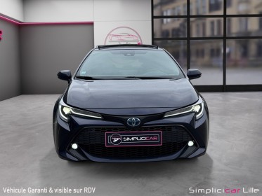 Toyota corolla hybride my21 122h design toit ouvrant occasion simplicicar lille  simplicicar simplicibike france