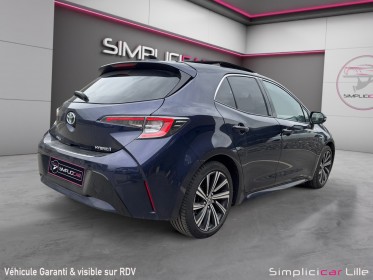 Toyota corolla hybride my21 122h design toit ouvrant occasion simplicicar lille  simplicicar simplicibike france