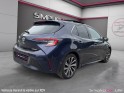 Toyota corolla hybride my21 122h design toit ouvrant occasion simplicicar lille  simplicicar simplicibike france