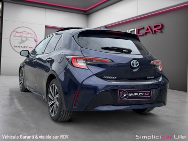 Toyota corolla hybride my21 122h design toit ouvrant occasion simplicicar lille  simplicicar simplicibike france