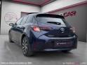 Toyota corolla hybride my21 122h design toit ouvrant occasion simplicicar lille  simplicicar simplicibike france