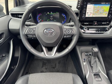 Toyota corolla hybride my21 122h design toit ouvrant occasion simplicicar lille  simplicicar simplicibike france