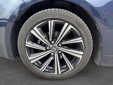 Toyota corolla hybride my21 122h design toit ouvrant occasion simplicicar lille  simplicicar simplicibike france