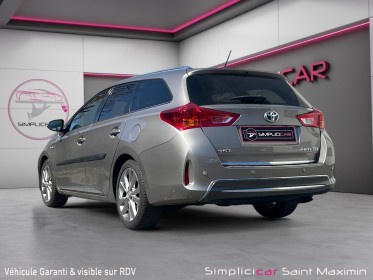 Toyota auris touring sports hybride 136h style  / entretien full toyota occasion simplicicar st-maximin simplicicar...