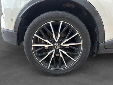 Toyota c-hr hybride 122ch distinctive 1er main suivi toyota complet caméra cuir chauffant garantie constructeur 2 ans...