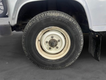 Land rover defender td5 2l5 station wagon 9 places // clim / attelage / marche pied / entretien a jour / vitres arrieres......