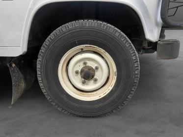Land rover defender td5 2l5 station wagon 9 places // clim / attelage / marche pied / entretien a jour / vitres arrieres......