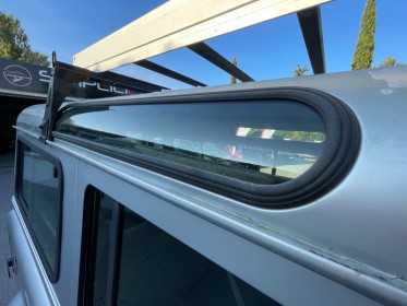 Land rover defender td5 2l5 station wagon 9 places // clim / attelage / marche pied / entretien a jour / vitres arrieres......