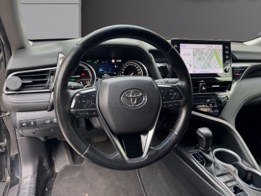 Toyota camry hybride my21 218ch 2wd design/entretien a jour/siege chauffant occasion paris 17ème (75)(porte maillot)...