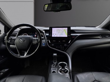 Toyota camry hybride my21 218ch 2wd design/entretien a jour/siege chauffant occasion paris 17ème (75)(porte maillot)...
