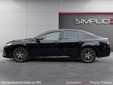 Toyota camry hybride my21 218ch 2wd design/entretien a jour/siege chauffant occasion paris 17ème (75)(porte maillot)...