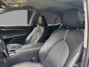 Toyota camry hybride my21 218ch 2wd design/entretien a jour/siege chauffant occasion paris 17ème (75)(porte maillot)...