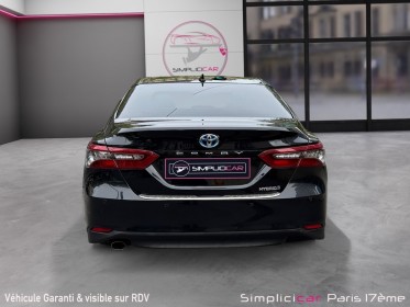 Toyota camry hybride my21 218ch 2wd design/entretien a jour/siege chauffant occasion paris 17ème (75)(porte maillot)...