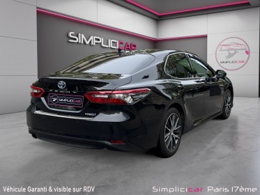 Toyota camry hybride my21 218ch 2wd design/entretien a jour/siege chauffant occasion paris 17ème (75)(porte maillot)...