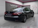 Toyota camry hybride my21 218ch 2wd design/entretien a jour/siege chauffant occasion paris 17ème (75)(porte maillot)...