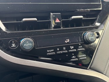 Toyota camry hybride my21 218ch 2wd design/entretien a jour/siege chauffant occasion paris 17ème (75)(porte maillot)...
