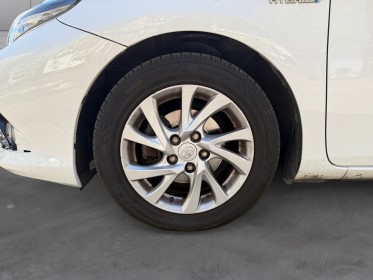Toyota auris business hybride 136h design business/entretien toyota/garantie 12 mois occasion paris 17ème (75)(porte...