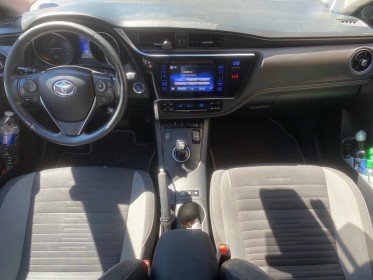 Toyota auris pro rc18 hybride pro 136h design business occasion cannes (06) simplicicar simplicibike france