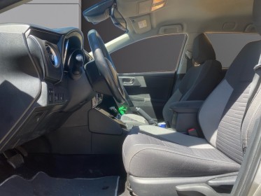 Toyota auris pro rc18 hybride pro 136h design business occasion cannes (06) simplicicar simplicibike france