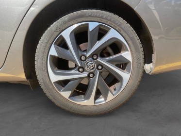 Toyota auris pro rc18 hybride pro 136h design business occasion cannes (06) simplicicar simplicibike france