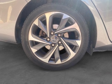 Toyota auris pro rc18 hybride pro 136h design business occasion cannes (06) simplicicar simplicibike france