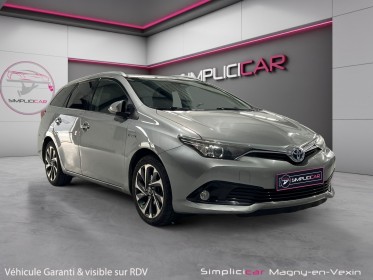 Toyota auris touring sports pro rc18 hybride pro 136h design business occasion simplicicar magny-en-vexin simplicicar...