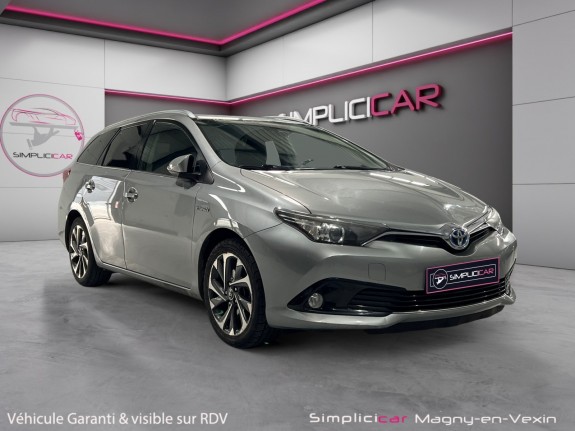 Toyota auris touring sports pro rc18 hybride pro 136h design business occasion simplicicar magny-en-vexin simplicicar...