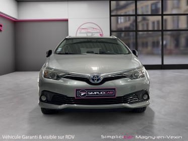 Toyota auris touring sports pro rc18 hybride pro 136h design business occasion simplicicar magny-en-vexin simplicicar...