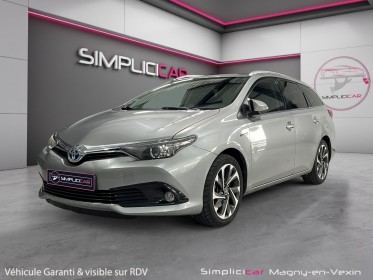 Toyota auris touring sports pro rc18 hybride pro 136h design business occasion simplicicar magny-en-vexin simplicicar...