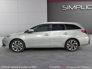 Toyota auris touring sports pro rc18 hybride pro 136h design business occasion simplicicar magny-en-vexin simplicicar...