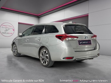 Toyota auris touring sports pro rc18 hybride pro 136h design business occasion simplicicar magny-en-vexin simplicicar...