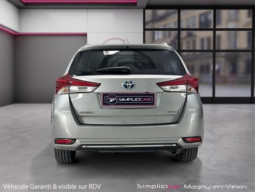 Toyota auris touring sports pro rc18 hybride pro 136h design business occasion simplicicar magny-en-vexin simplicicar...